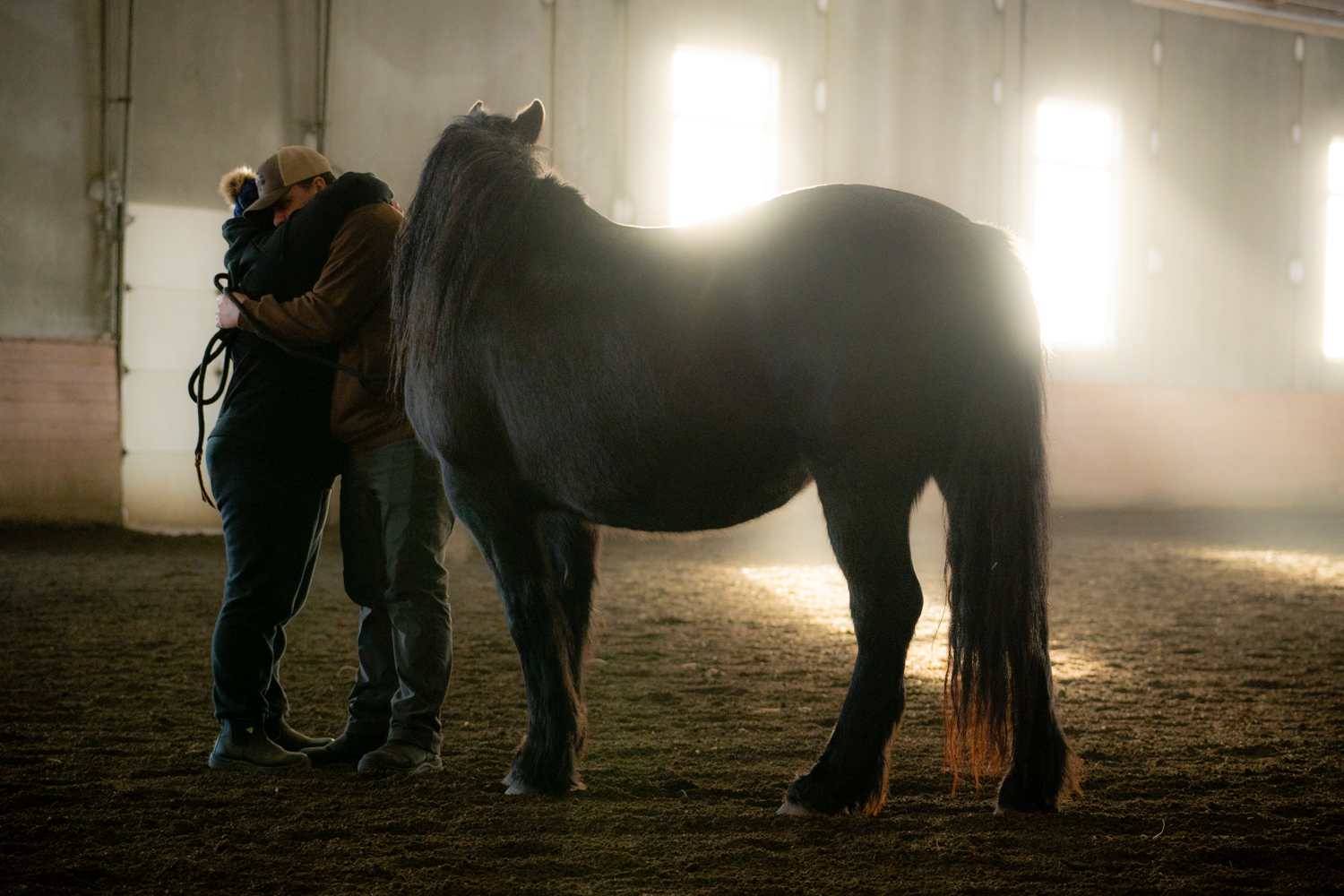 Two participants hugging after doing a therapy session with a therapy hose at Can Praxis